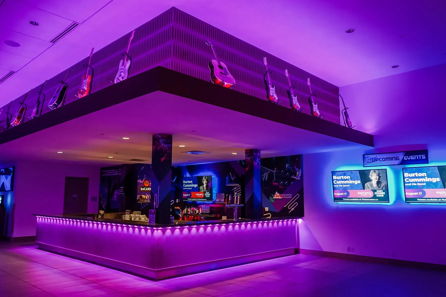 The same indoor bar lit purple