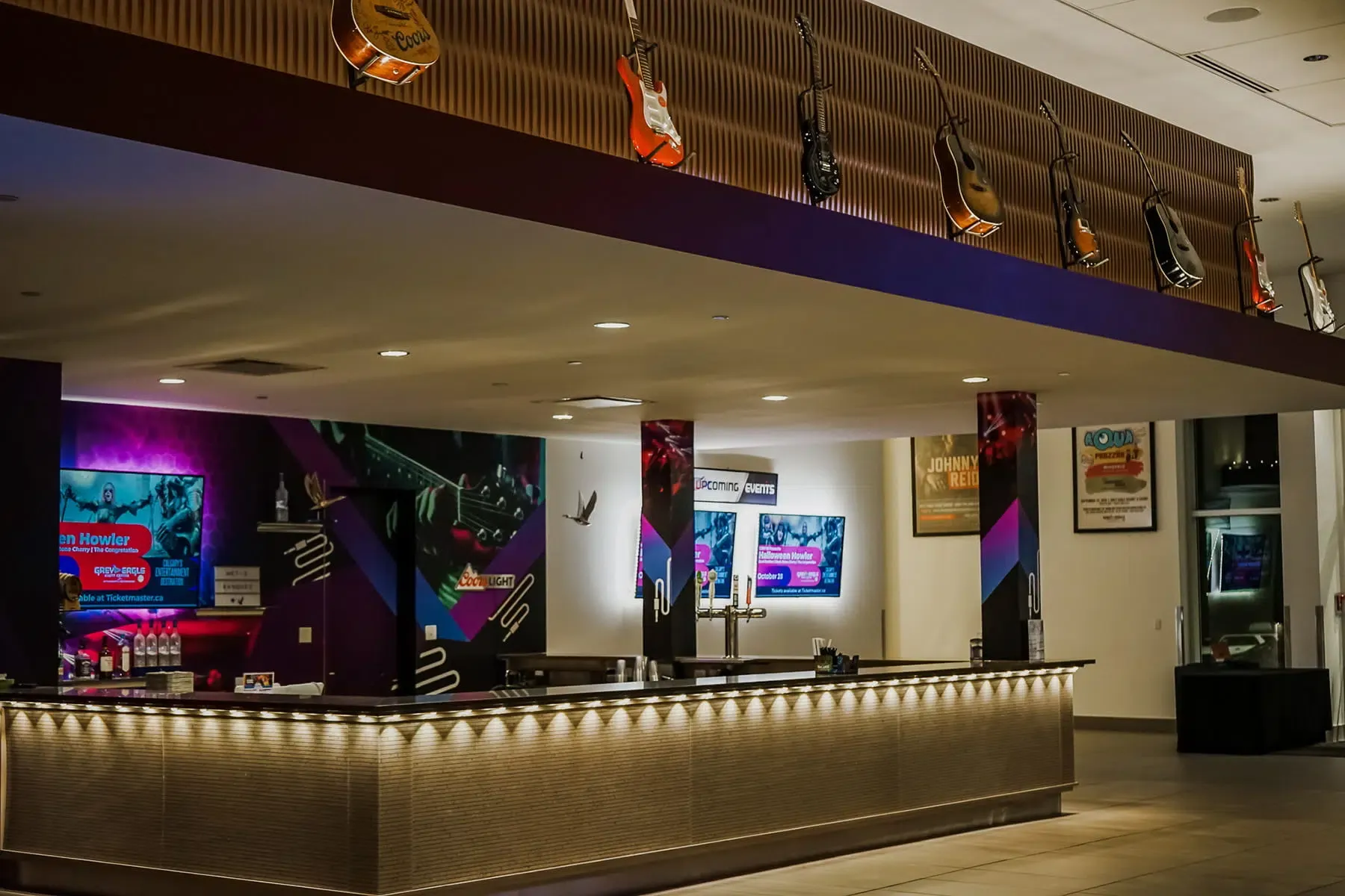 Indoor bar with warm white lights along the counter