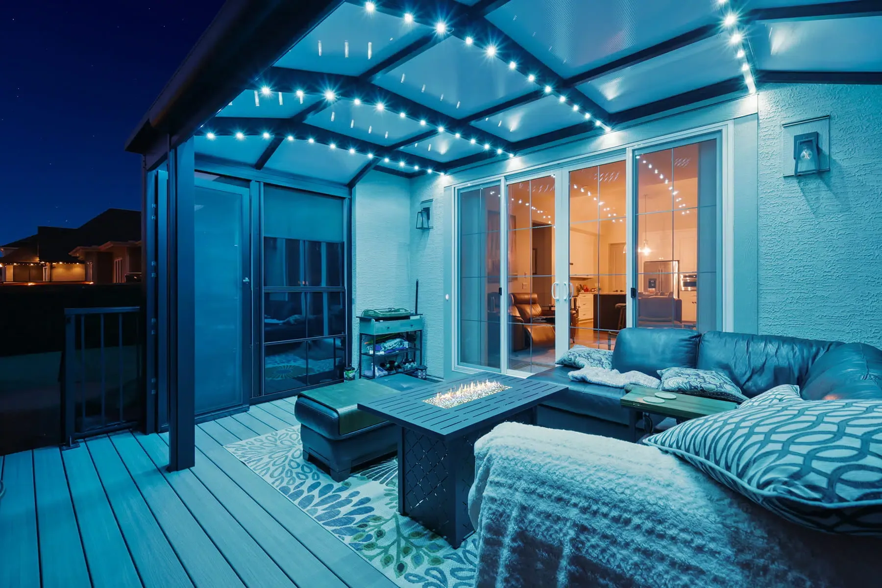 Covered patio with string lights in cool blue