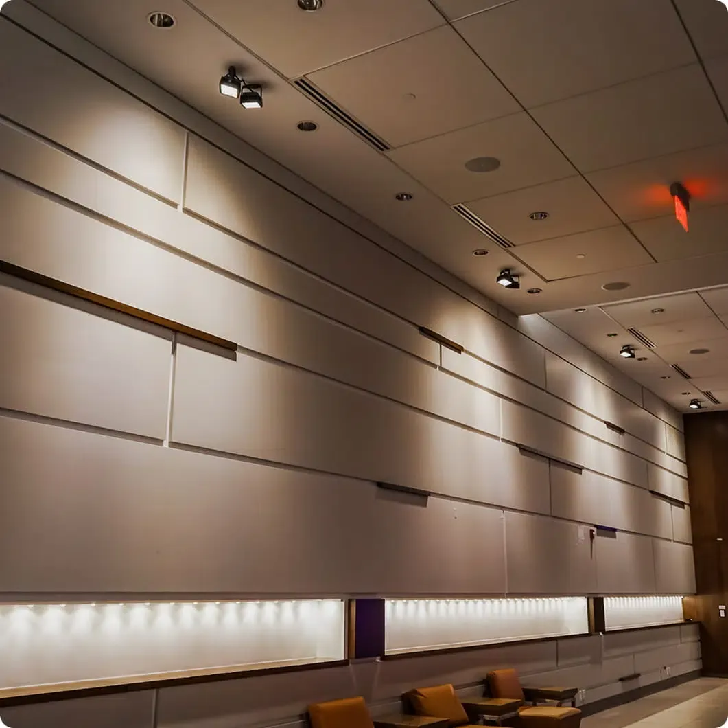 Interior wall washed in warm white light from flood LED lights