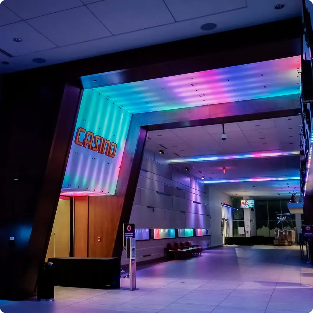 Entrance with colourful strip lights along the ceiling