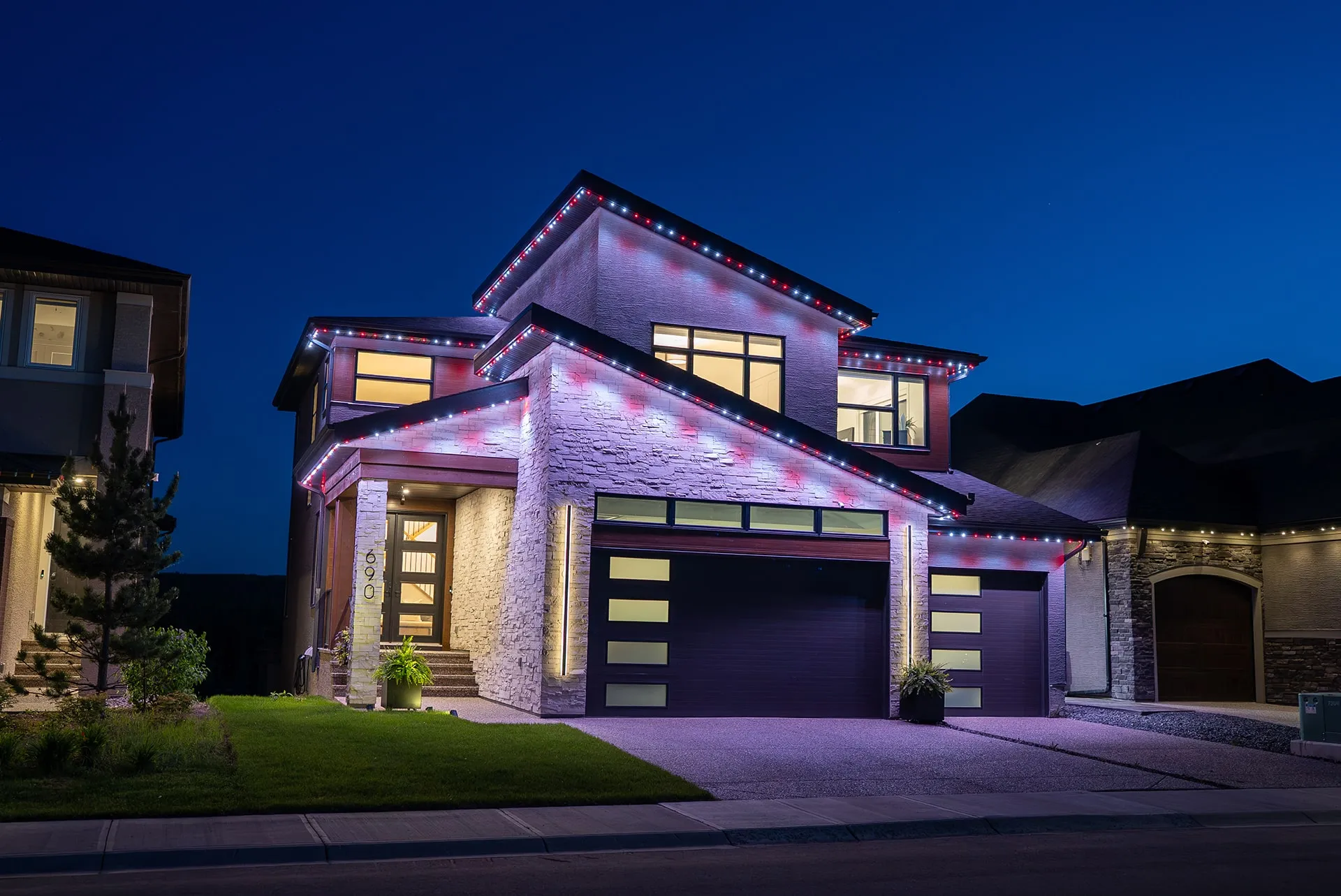 Modern stone house with soft multicolour lights